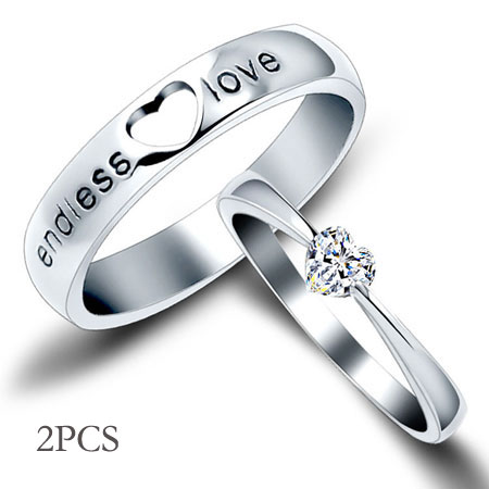 Heart Engraved Sterling Silver His and Her Wedding Ring Sets
