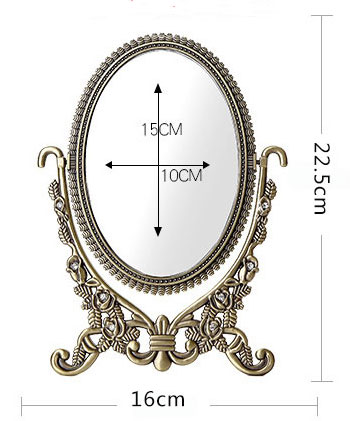 Specchi da tavolo antichi con struttura in metallo intagliato in bronzo ovale